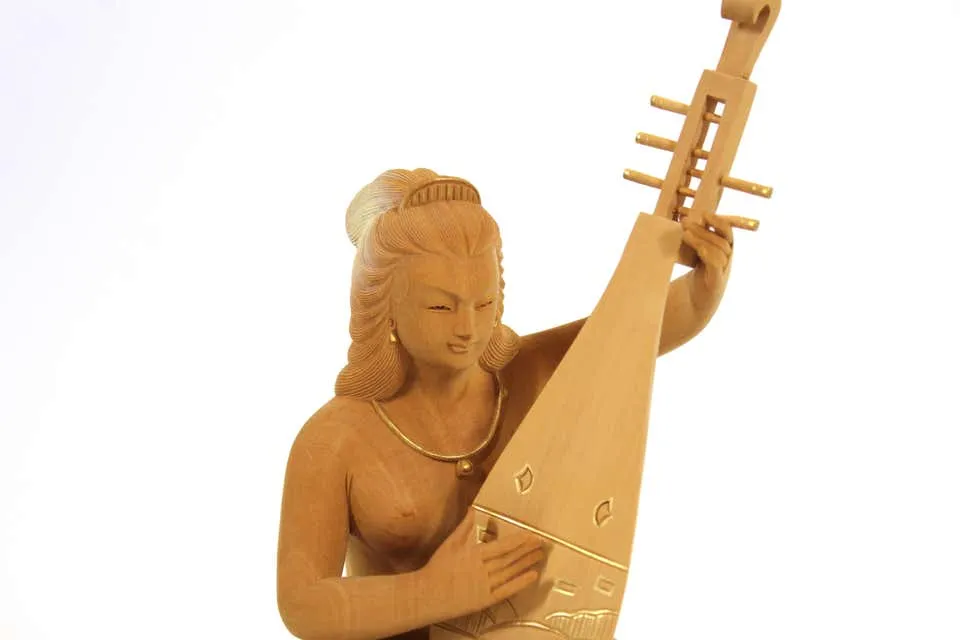 Japanese Okimono of a Shunga Lady Playing a Biwa