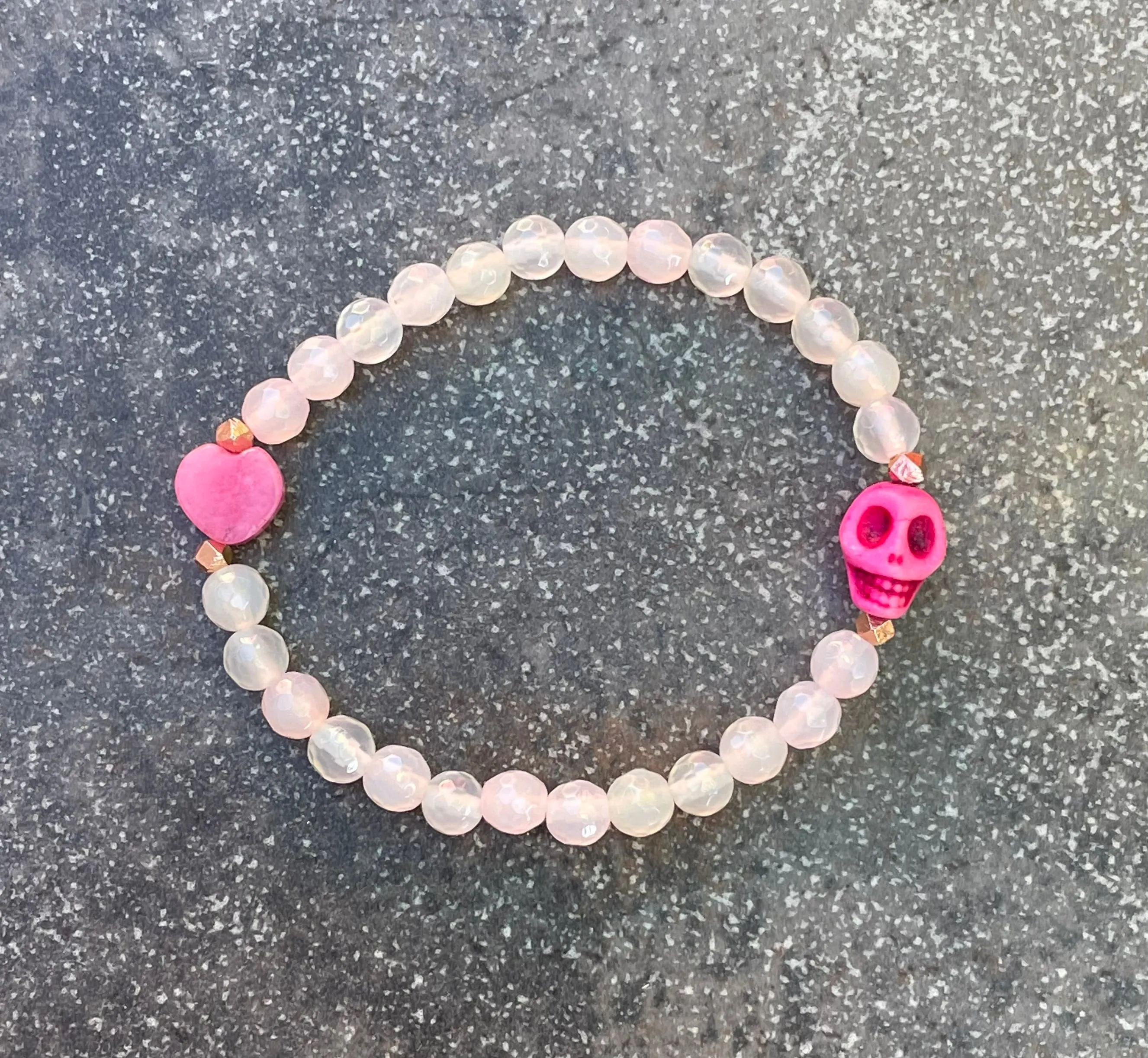 Pink Agate, pink Jade gemstone, and Howlite Skull bracelet