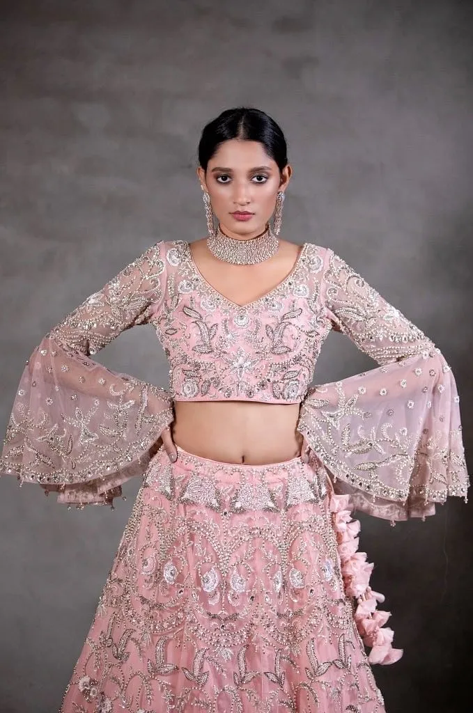 Soft pink peplum Lehenga set.