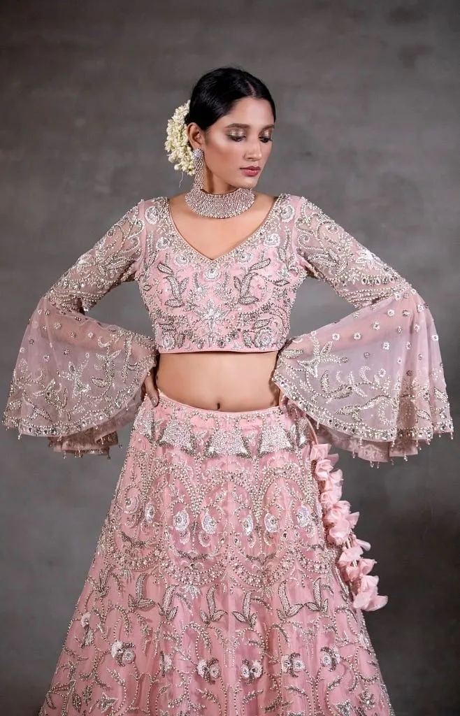 Soft pink peplum Lehenga set.